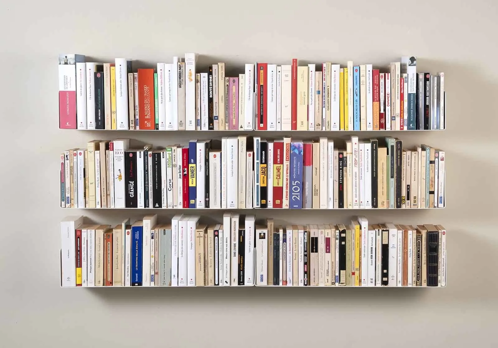 A rather organised looking set of bookshelves